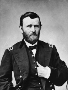 The 18th president has his hand in his shirt while wearing his general uniform